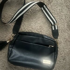Black Crossbody Bag with Striped Strap